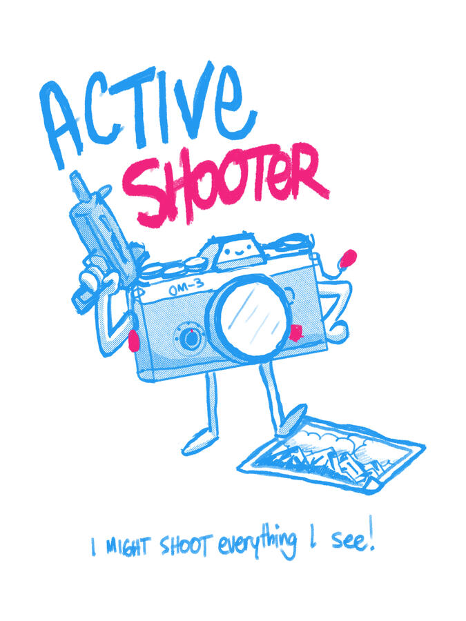 Camera holding an uzi Camera holding an uzi